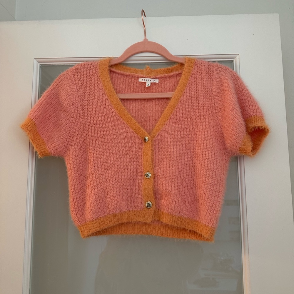 Soft peach crop top with custom buttons
